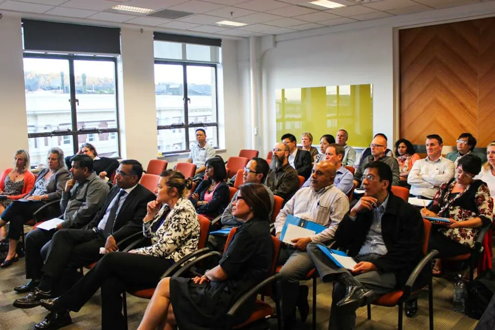 Ifthi Idris speaking to seminar participants at a business event