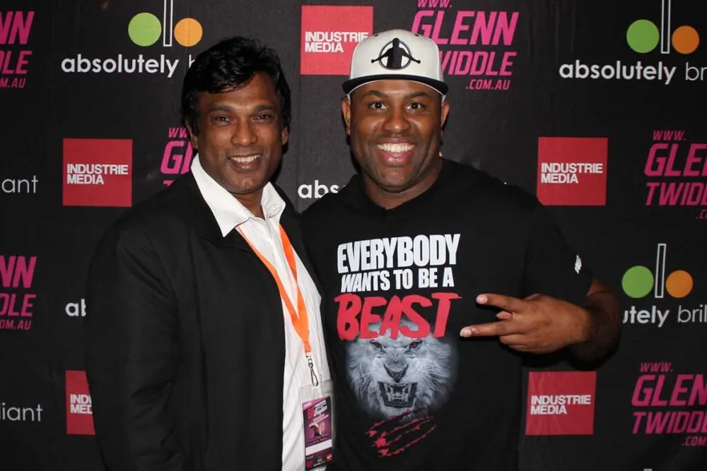 Ifthi Idris with Eric Thomas, American motivational speaker and author, at a business event