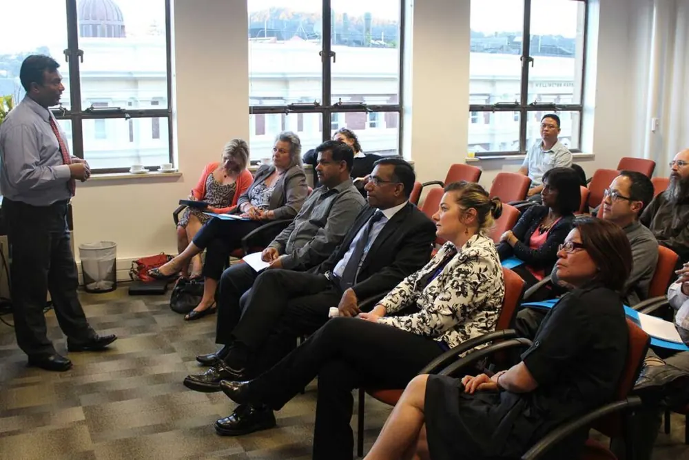 Ifthi Idris sharing business advice with attendees at a networking event
